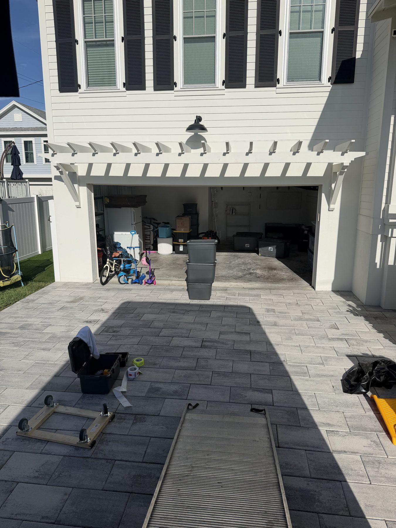 A Tampa Bay home on moving day with a loaded moving truck out front