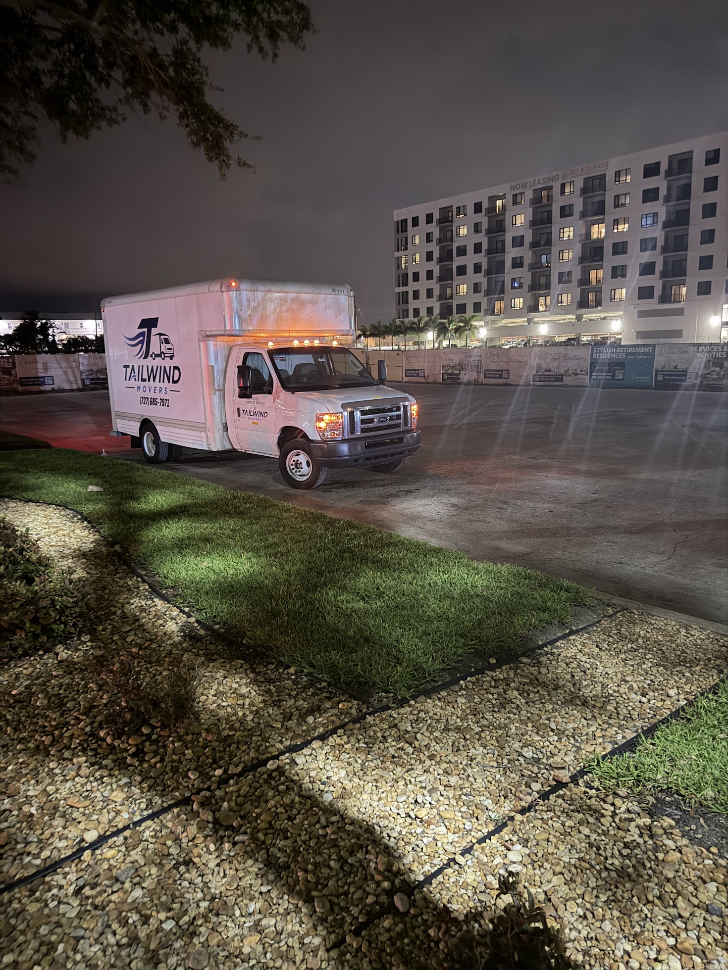 Tailwind Movers truck on location for an evening job