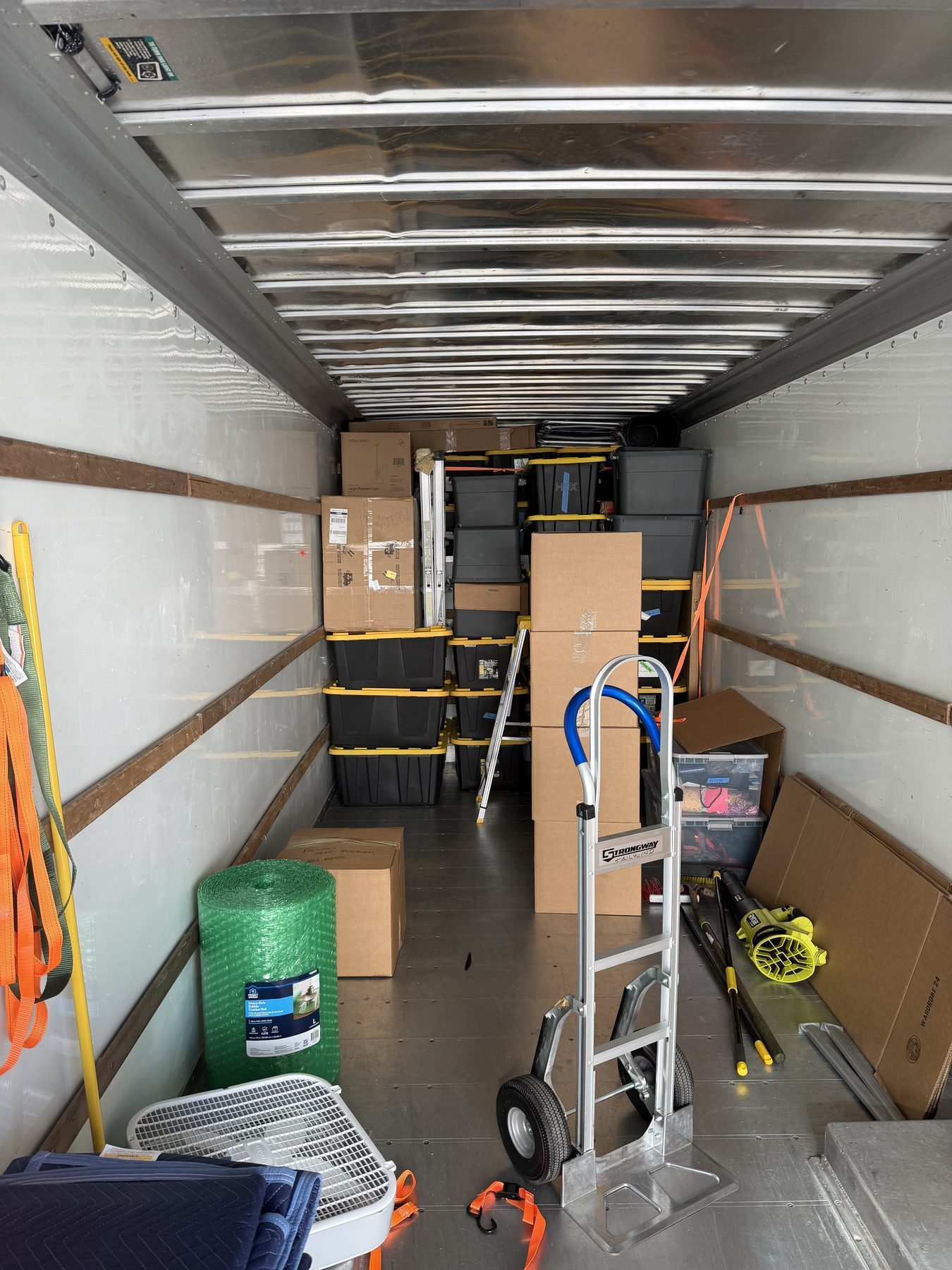 Inside a Tailwind Movers truck, neatly loaded and strapped